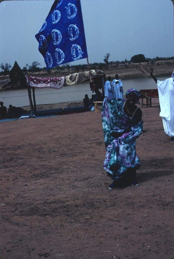 Wourri Kebe entertaining crowds awaiting the President's arrival